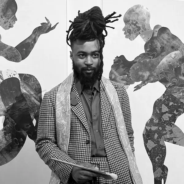Ousmane BÂ, a french artist in front of his paintings